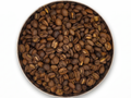 Coffee beans in a round container on a white background